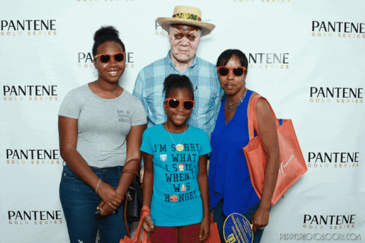 Tianna, her grandparents, and her younger cousin Sydney at the Black Family Reunion which is usually held downtown Tianna, her grandparents, and her younger cousin Sydney at the Black Family Reunion which is usually held downtown