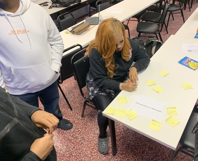 students working on an activity Detroit academy scholars working on an activity